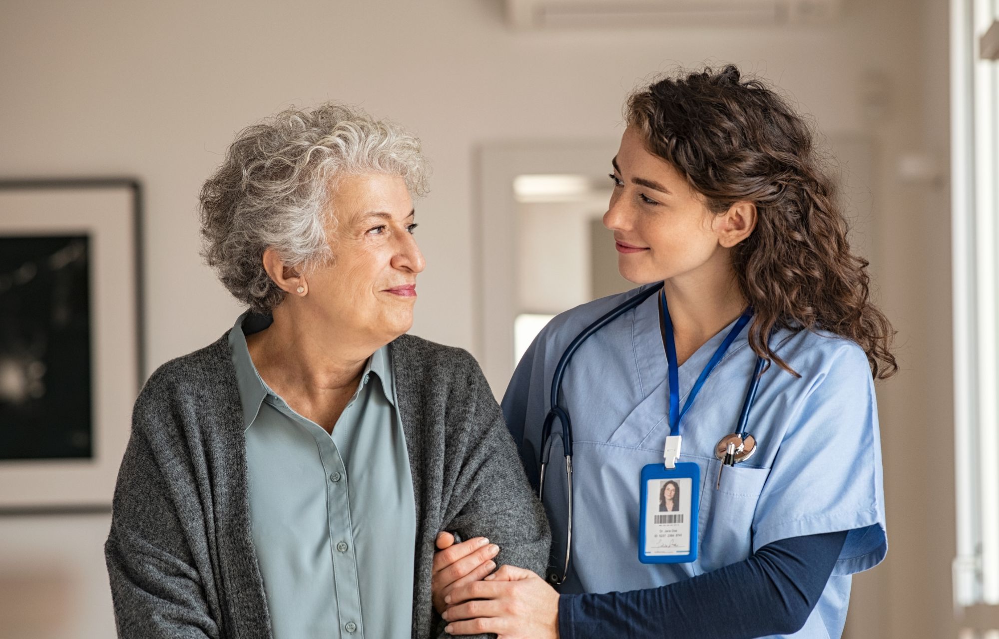 nurse walking with elderly