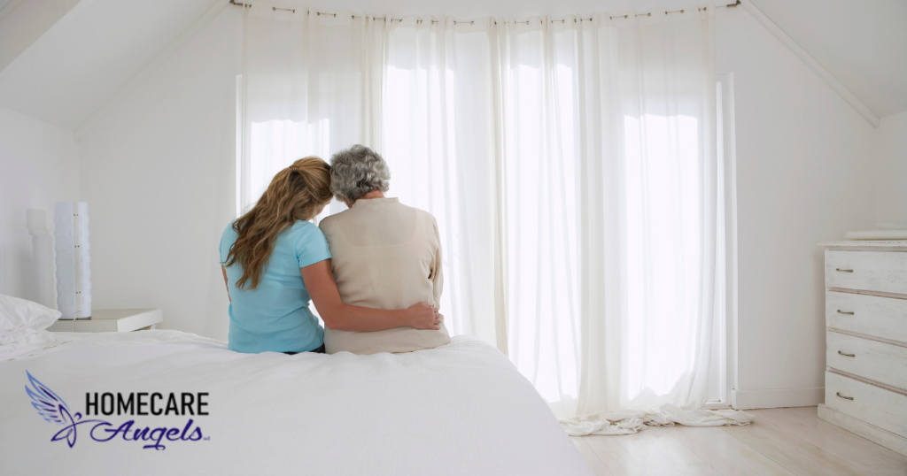 A family caregiver hugs her loved one and is better able to enjoy her time with her after taking a break by using respite care services.