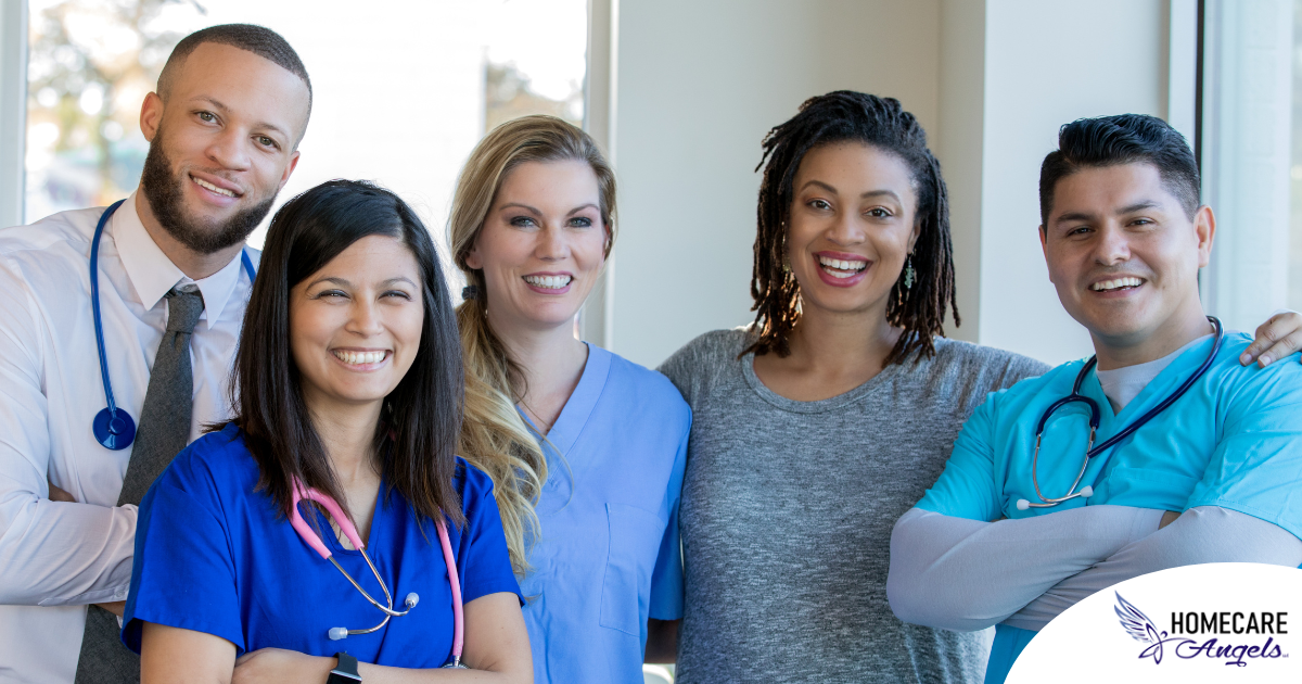 A team of healthcare professionals smiles, representing the many career paths that professional caregiving can lead to.