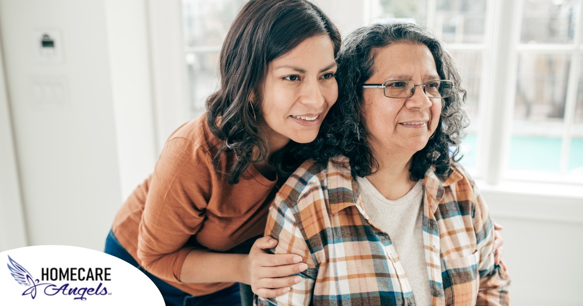 A woman hugs her older mother, representing compassionate senior care