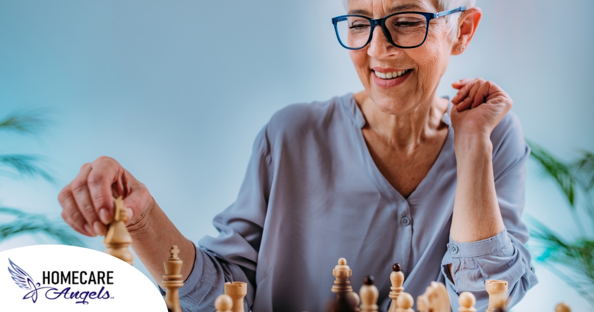 An older woman plays chess, an activity that can help older adults stay sharp.