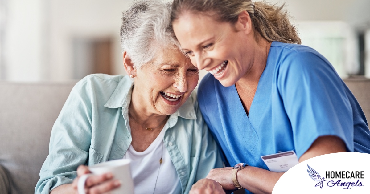 A caregiver laughs with a client representing how good social skills can help professional caregivers.