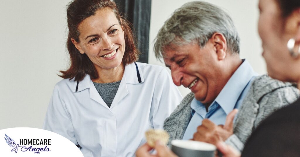 A woman smiles while with clients showing how you can enjoy senior caregiver jobs.