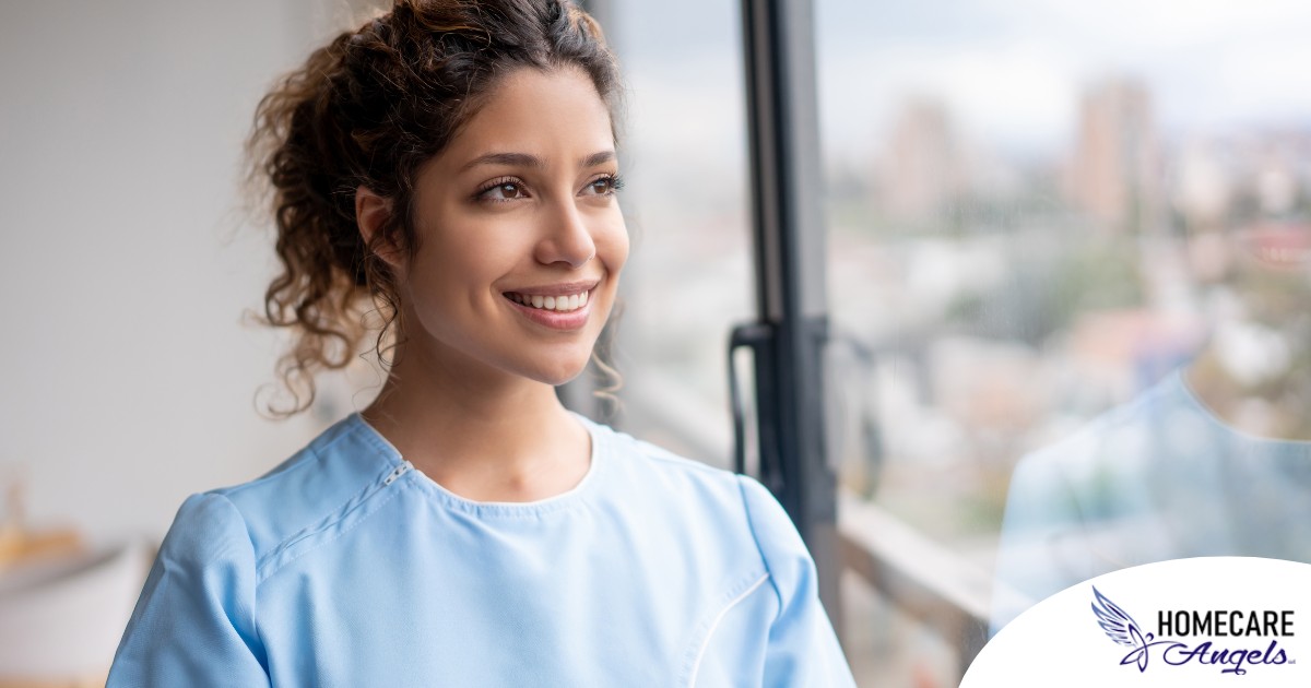 A woman smiles while looking ahead hopefully, showing the positive outlook that planning for a home care career can bring.