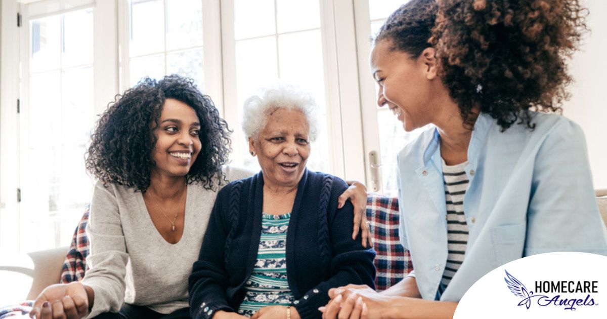 Caregiver talking to a family about Elderly Care